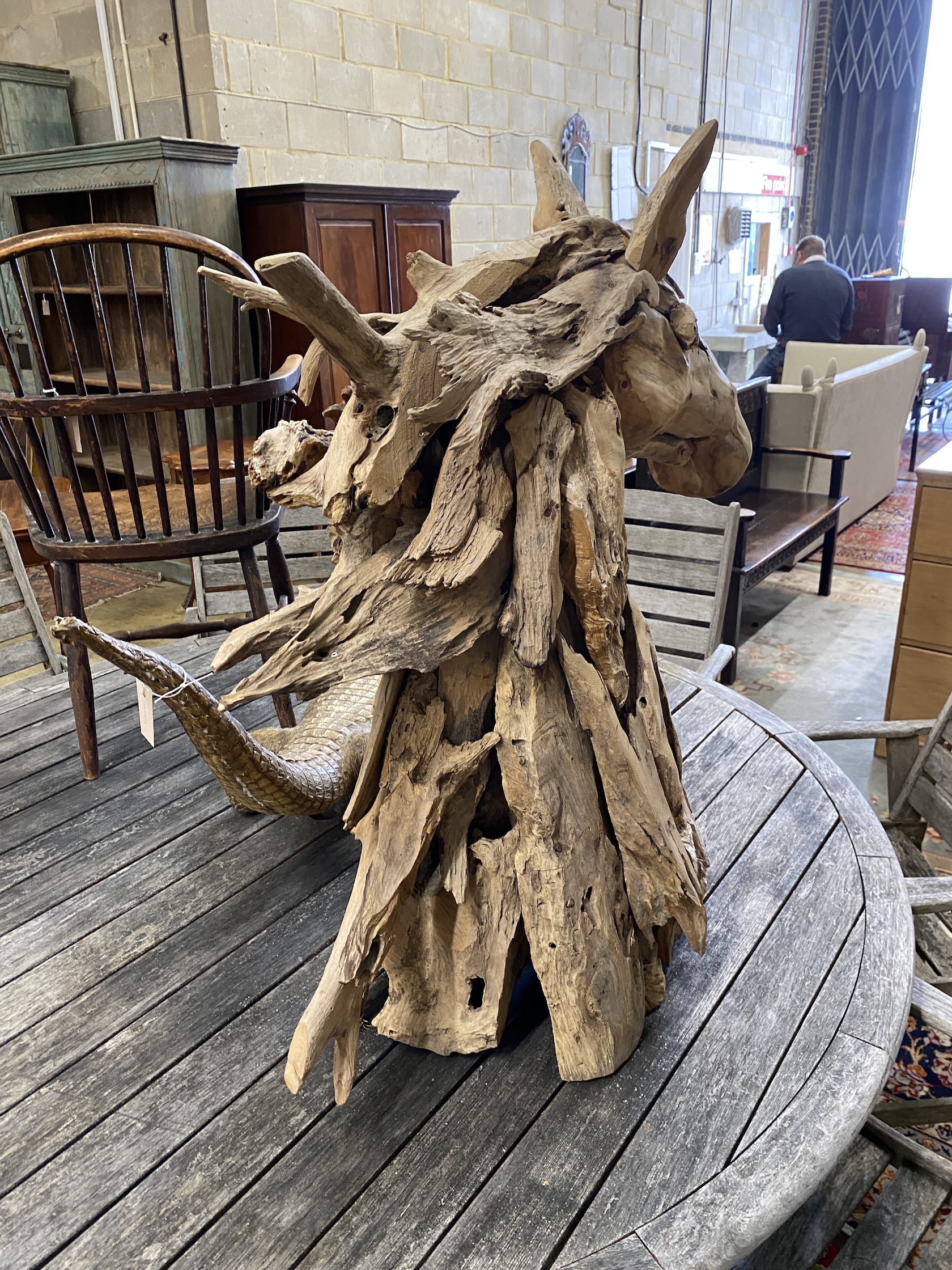 A carved driftwood horse head sculpture, height 98cm
